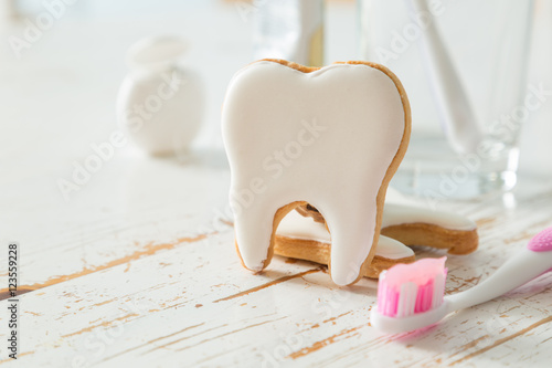 Naklejka Teeth shaped cookies background