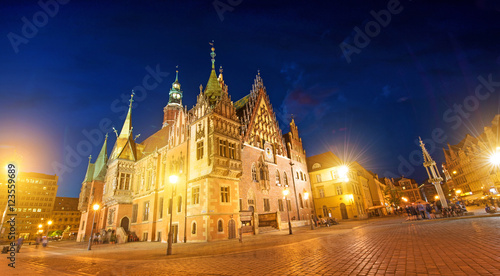 Fototapeta Naklejka Na Ścianę i Meble -  fantastic urban landscape with Town Hall on the medieval Market