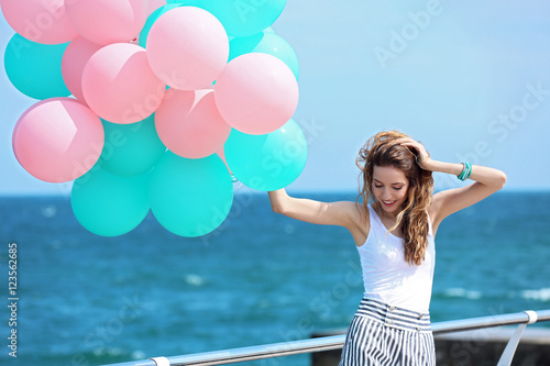Beautiful young woman with ...
