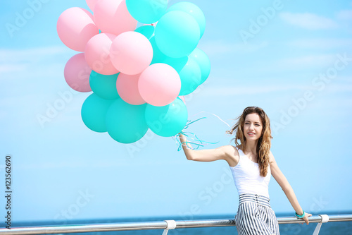 Beautiful young woman with ...