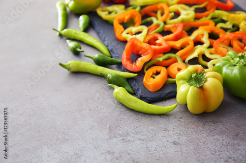 Pepper slices on gray background