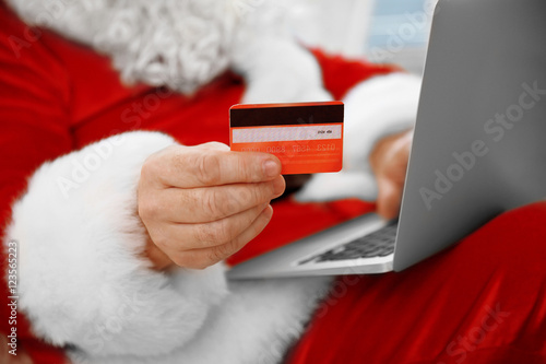 Santa Claus with credit car...