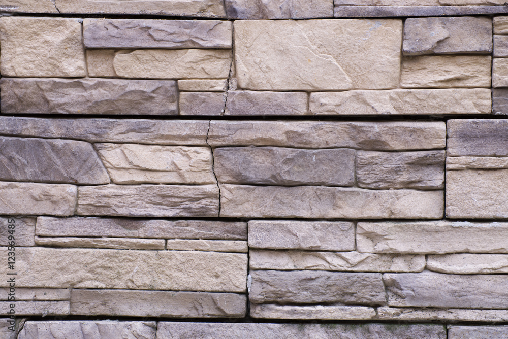 Obraz premium Кирпичная стена из булыжников 