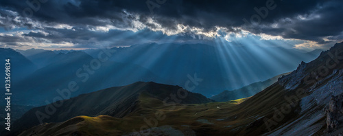 Fototapeta Naklejka Na Ścianę i Meble -  Mountain valley in beams of evening sun. Caucasus mountains.