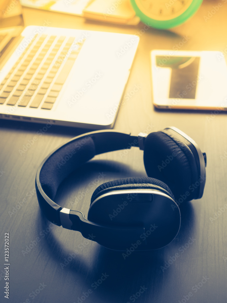 Headphone with Laptop on office desk. Headphone with Laptop on office desk.