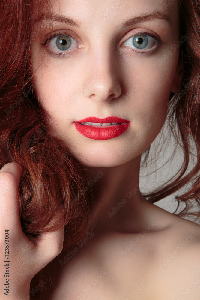 Portrait of beautiful redhead girl close up Portrait of beautiful redhead girl close up