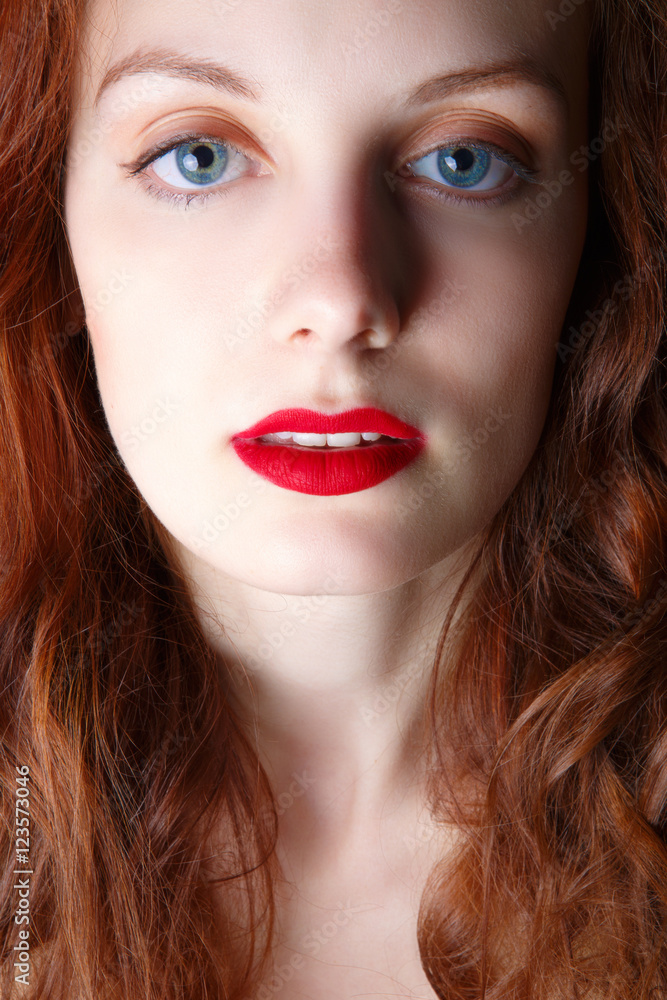 Portrait of beautiful redhead girl close up Portrait of beautiful redhead girl close up