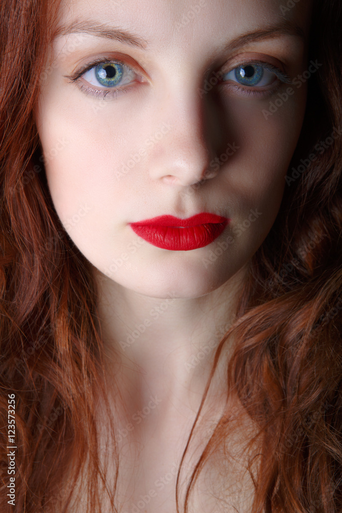 Portrait of beautiful redhead girl close up Portrait of beautiful redhead girl close up