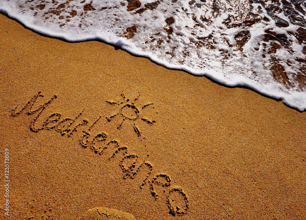 Fototapeta premium Mediterranean sign on the sand beach