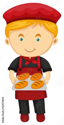 Male baker holding tray of bread