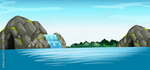 Scene with waterfall and cave