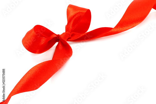 Big red holiday bow on white background