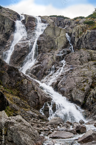 Fototapeta Naklejka Na Ścianę i Meble -  mountain waterfall / Mountain view with the huge waterfall
