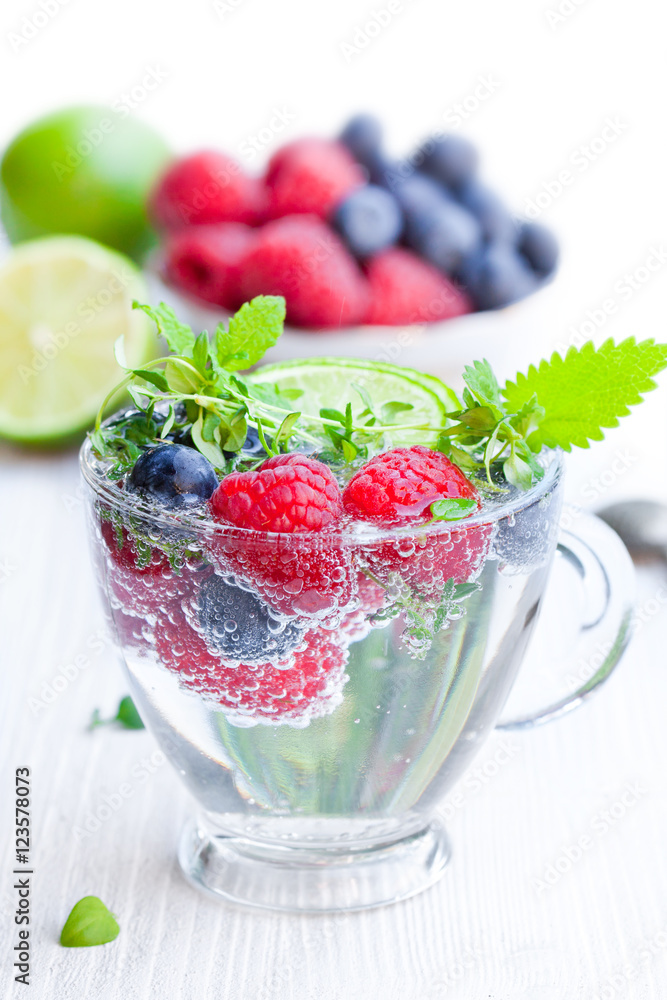 Detox water. Homemade summer fruit drink with raspberry and blu Detox water. Homemade summer fruit drink with raspberry and blu