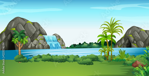 Scene with waterfall and field