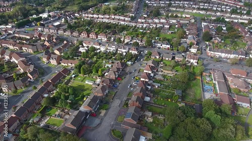 Tilting aerial shot of a residential area in England. photo