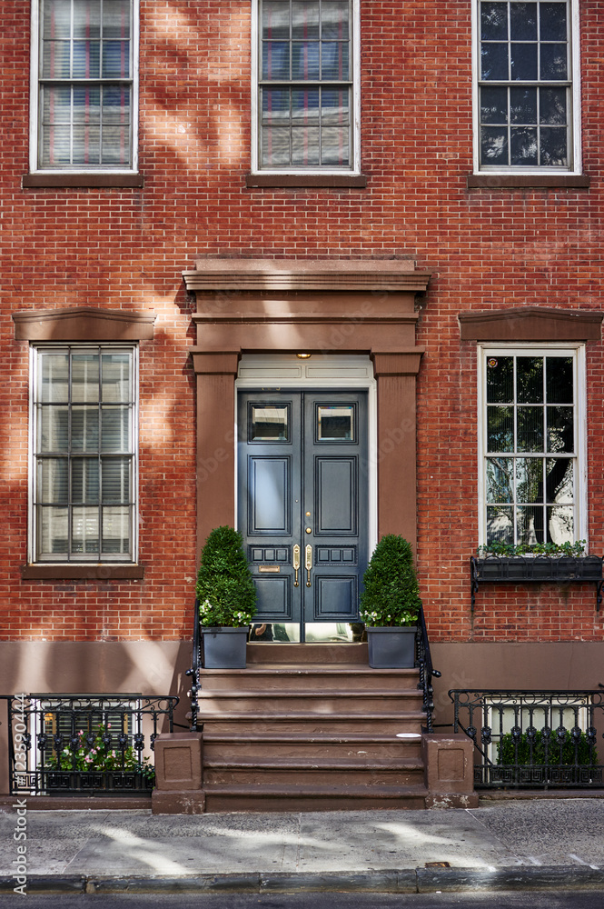 the front of a brownstone building the front of a brownstone building