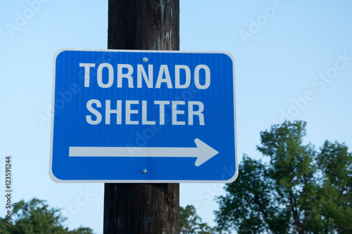 Tornado shelter sign to guide people to safety in tornado emergency
