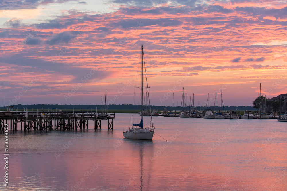 Spectacular sunset over the inter coastal waterway. Sailboats. Beautiful skies.