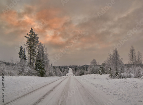 Colorful Sunset over Finnish Road © VitalyTitov