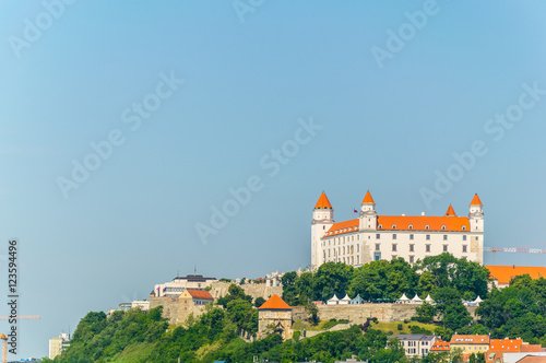 Canvas Print view of the bratislava castle situated on a hill next to the danube river in slo