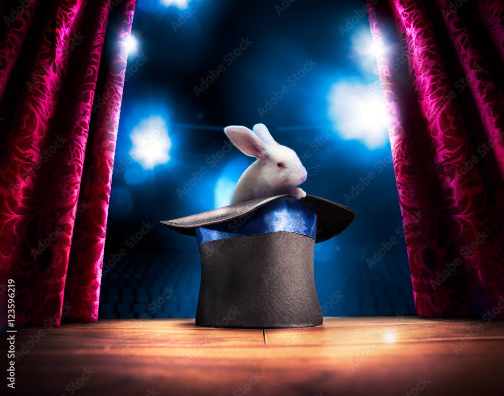 High contrast image of magician hat on a stage - obrazy, fototapety, plakaty 