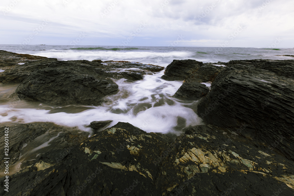 View of the rocky ocean shore