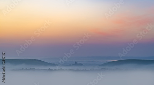 Rainbow skies in the Dorset Purbeck Hills above Corfe Castle © allouphoto