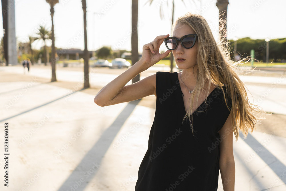 Attractive blond woman portrait at sunset Attractive blond woman portrait at sunset