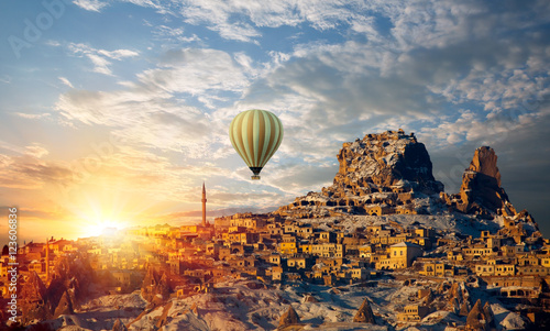 Hot air balloon flying over spectacular Cappadocia photo