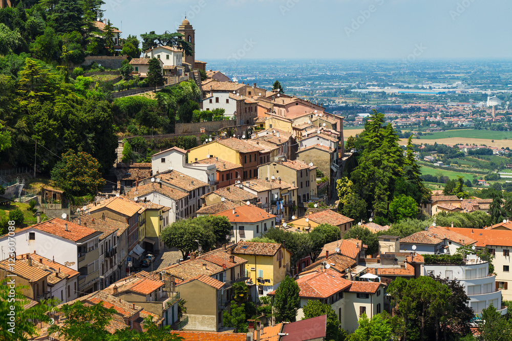 landscape with roofs of houses in small tuscan town in province
