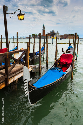 Photography Gondolas moored by Saint Mark square