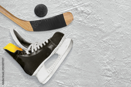 Hockey sticks, skate and puck