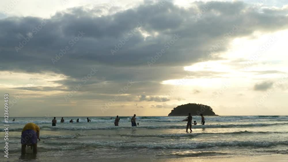 tourist relax on Kata beach during sunset time.in slow motion screen
tourist relax on Kata beach during sunset time.in slow motion screen