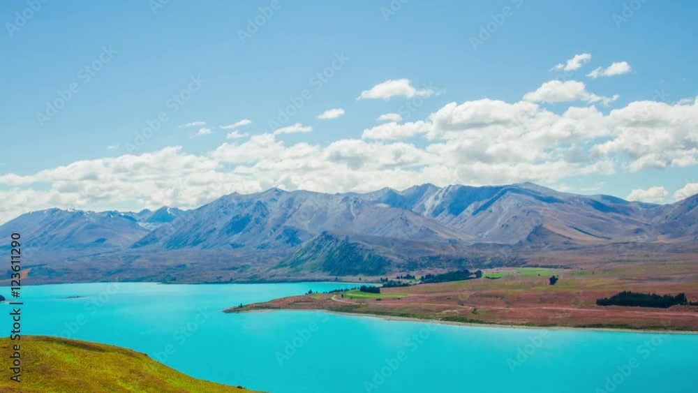 Time Lapse - Ariel View of Lake Tekapo with Mountain Range Time Lapse - Ariel View of Lake Tekapo with Mountain Range