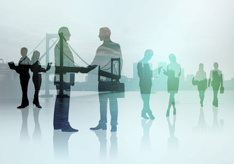business people silhouettes and modern cityscape