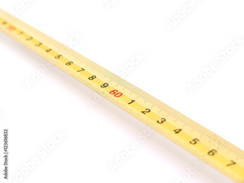 yellow measuring tape on white background