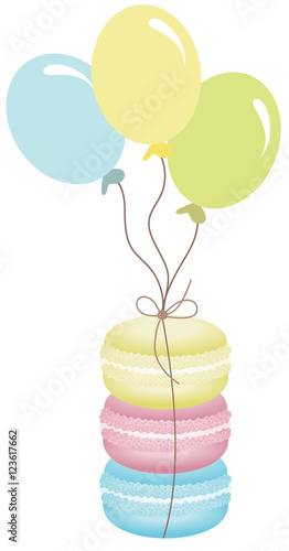 Macaroons tied with balloons
