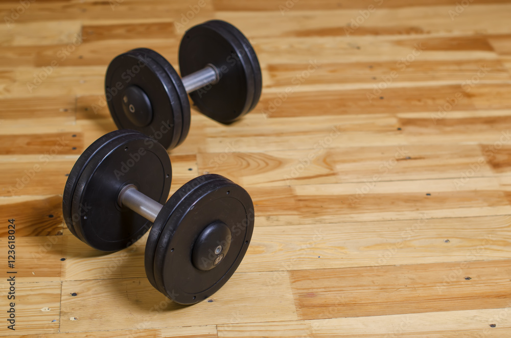 dumbbells on a floor in the gym dumbbells on a floor in the gym