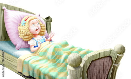 A girl in bed afraid