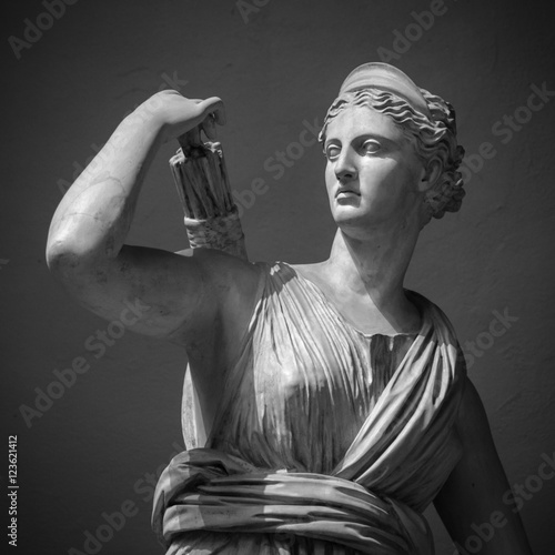 White marble head of young woman Artemis photo