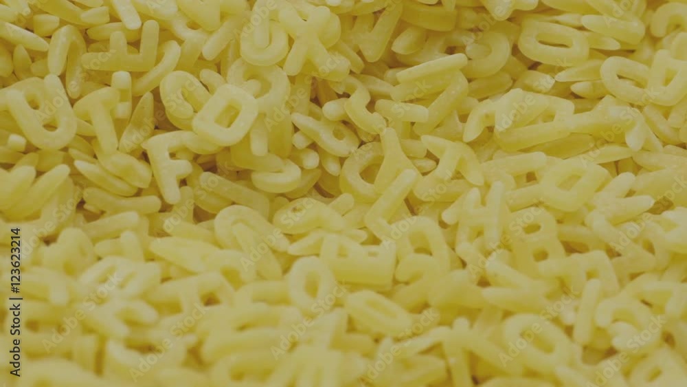 Letters spaghetti by background. 4K. Letters spaghetti by background. 4K.