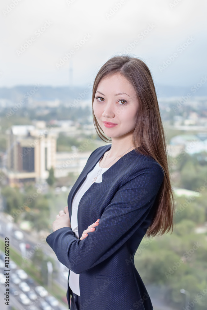 Young asian business woman about of the window