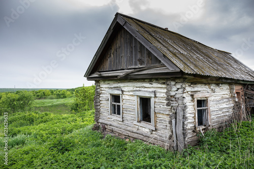 Dilapidated old village house in Russia