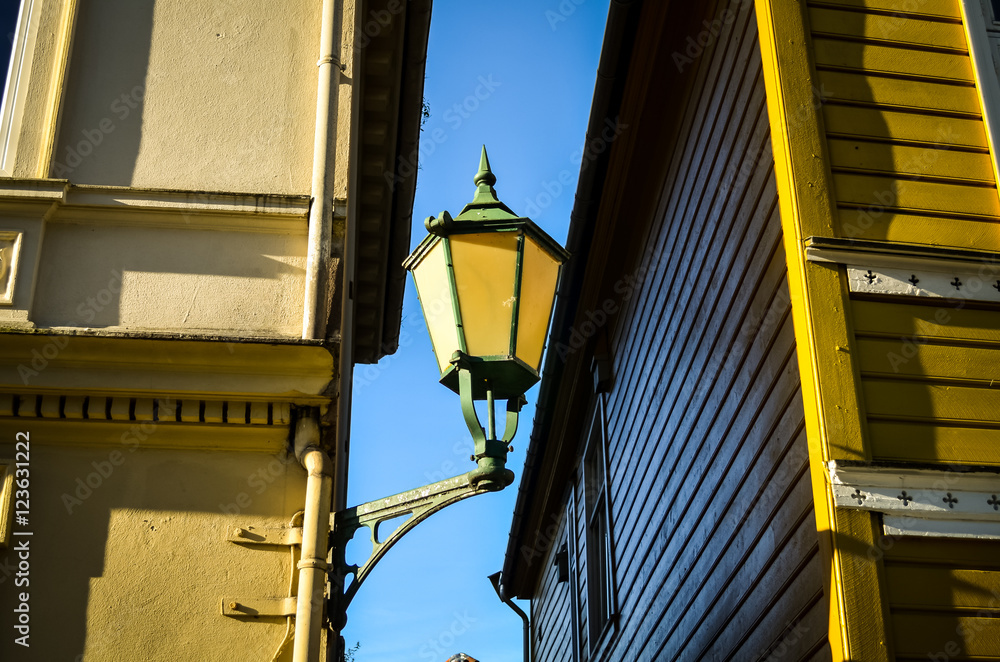 street light hanging on facades in bergen street light hanging on facades in bergen
