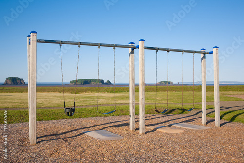 Swing set on a sunny day.