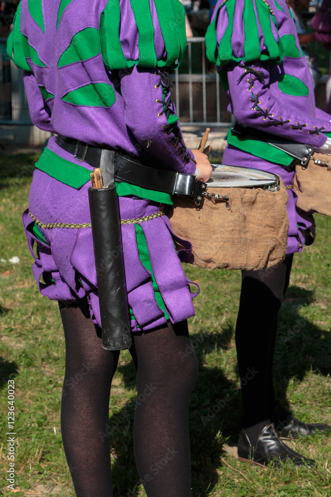 Drummers in Purple Uniform Playing Snare Drums