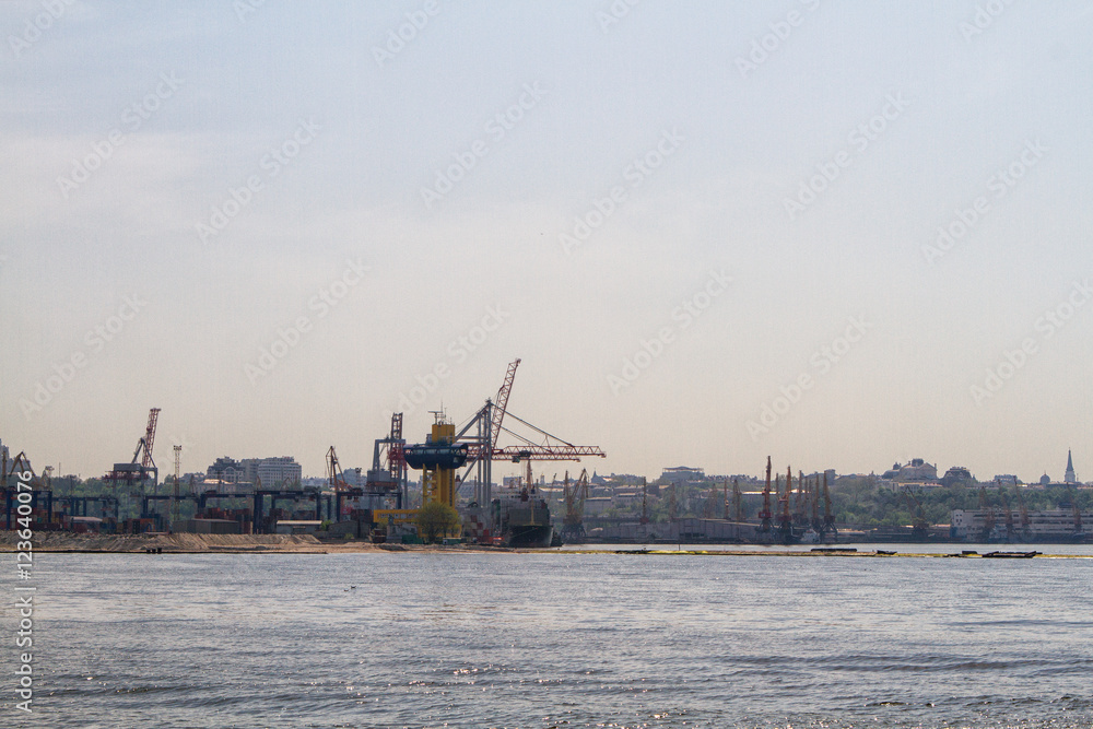 Cargo crane ship and grain dryer in port Odessa