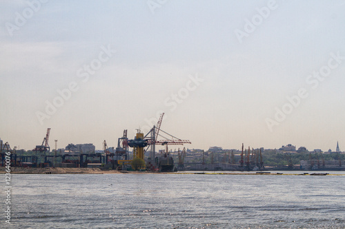 Cargo crane ship and grain dryer in port Odessa