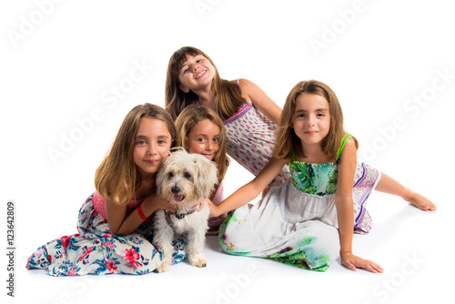 Group of girls playing with a dog